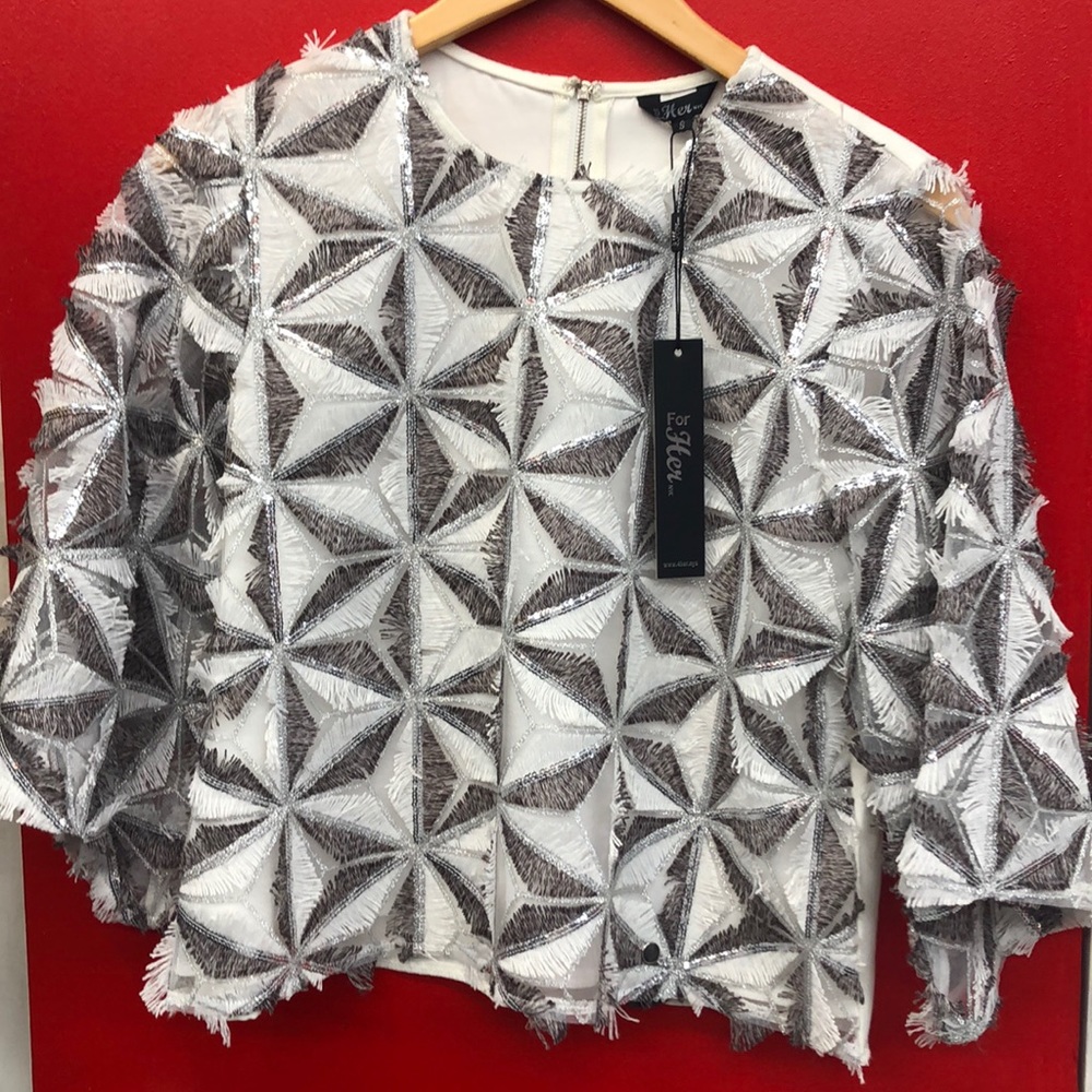 Beautiful new look! Unique top